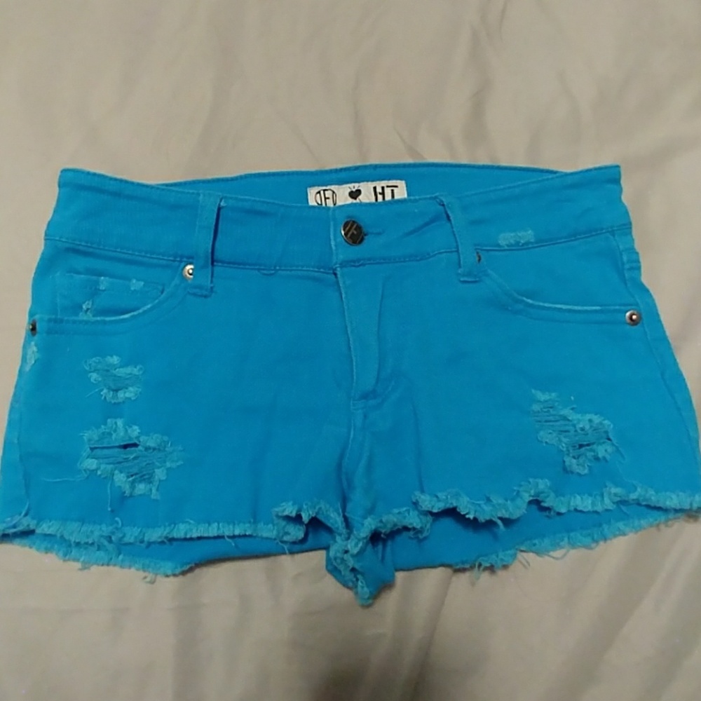 Blue distressed shorts